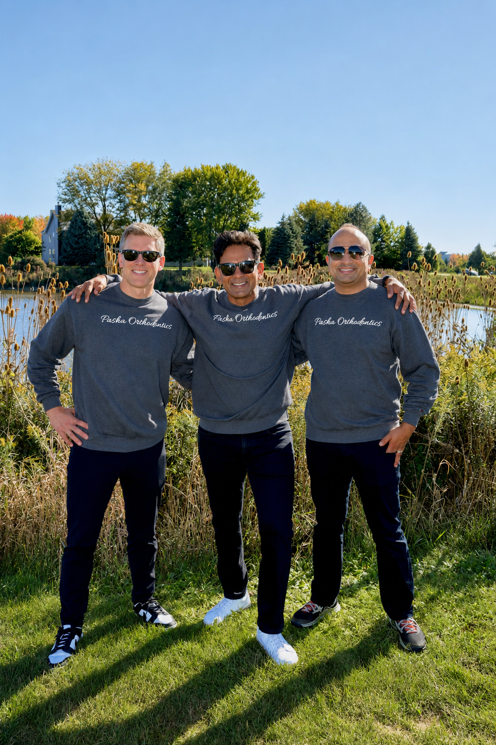 Doctors posing for a photo in the field